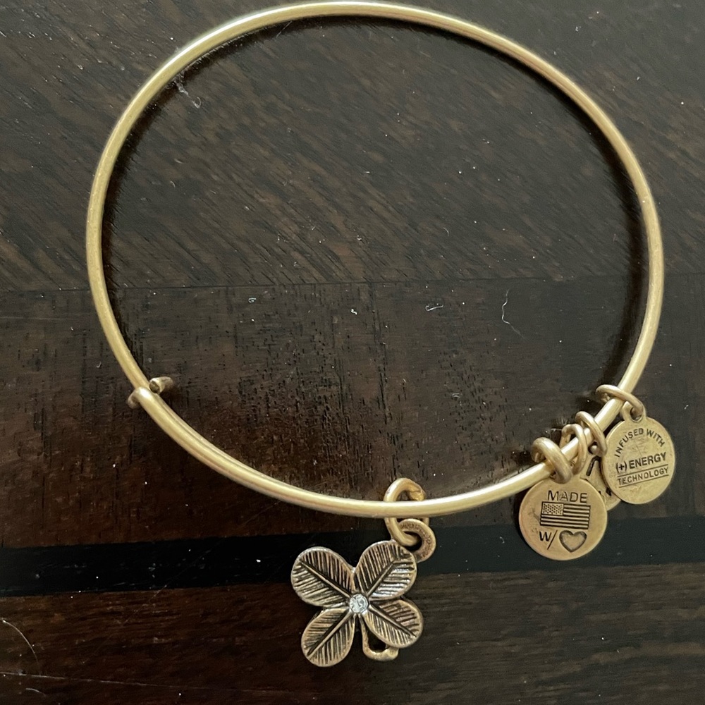 Alex and Ani bracelet with four leaf clover with crystal.